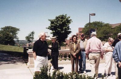 2004 Syracuse Reunion
At Syracuse University.
L to R: Harry Johnson, `51; Unidentified woman; (back to camera) John Centra, `54; Unidentified woman
