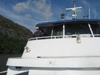 2010 Tours Boat
"Cap'n" John Rookwood, `57, surveys the scene from the bridge aboard the Pride of the Hudson.
